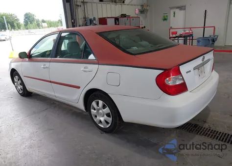 2003 Toyota Camry Le z USA, uszkodzony, nr VIN 4T1BE32K33U673674